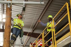 Patrick Smith, senior vice president of operations and technical services for Ameren Illinois, shares some safety advice with Apprentice Lineworker Wyatt Kapper, who is based in Decatur, Illinois. Smith said to always lead with competence over confidence. Competence is a behavior, while confidence is a feeling. Patrick Smith, senior vice president of operations and technical services for Ameren Illinois, shares some safety advice with Apprentice Lineworker Wyatt Kapper, who is based in Decatur, Illinois. Smith said to always lead with competence over confidence. Competence is a behavior, while confidence is a feeling.