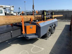 James Coleman and his team of lineworkers invented a new pole trailer to make it easier for line crews to transport and manage materials. James Coleman and his team of lineworkers invented a new pole trailer to make it easier for line crews to transport and manage materials.