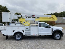 A newly finished Terex Hi-Ranger HR40 bucket truck rebuild awaits being picked up by the Coast Electric Power fleet crew. The lead time of a rebuilt bucket truck is very appealing to the fleet crew as once the chassis truck is found, the rebuild process at Terex Equipment Services takes as few as 6 to 8 weeks. A newly finished Terex Hi-Ranger HR40 bucket truck rebuild awaits being picked up by the Coast Electric Power fleet crew. The lead time of a rebuilt bucket truck is very appealing to the fleet crew as once the chassis truck is found, the rebuild process at Terex Equipment Services takes as few as 6 to 8 weeks.