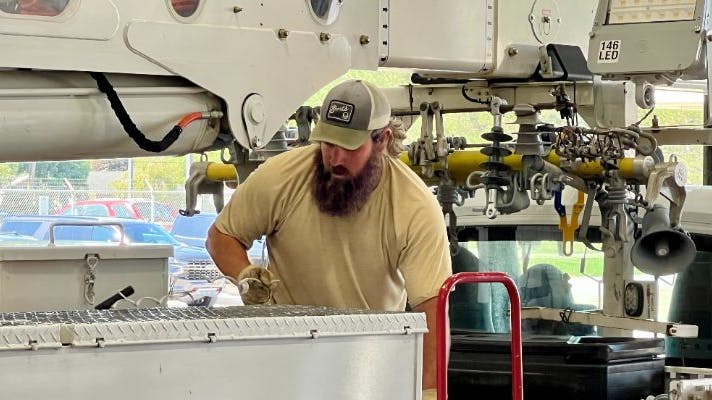 Elkhart lineworker packing up the truck to head to Ohio.