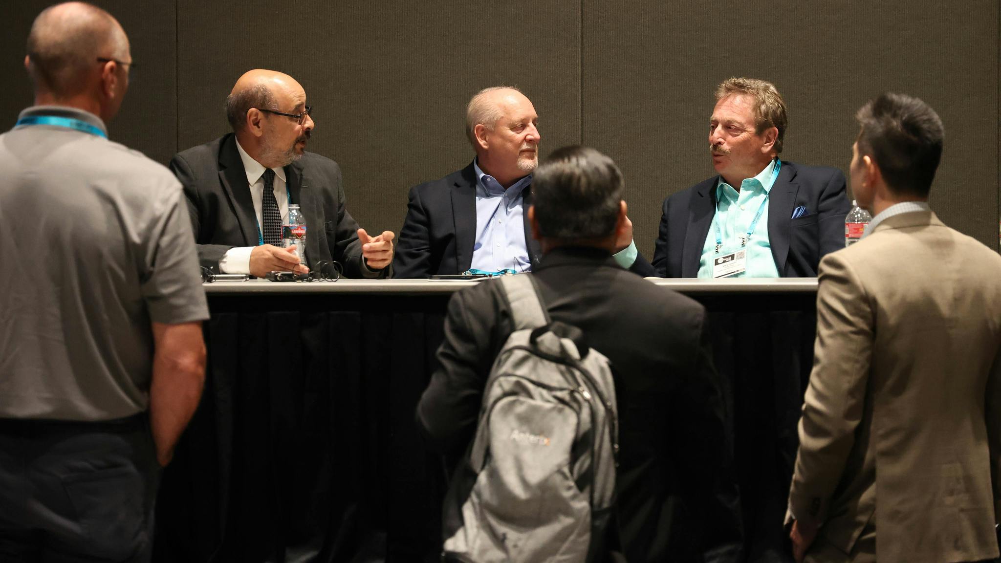 Session participants have opportunities to speak with presenters.