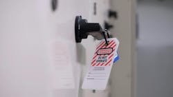 A lock out-tag out system in use to alert workers of a potential electrical problem. A lock out-tag out system in use to alert workers of a potential electrical problem.