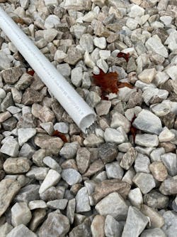 In this system, BGE routed discharge pipe to the highest point of the pit system to ensure that the clean water circulates through the pit system into the mother pit, thereby capturing any residual oil that might still be trapped in the filter cloth or stones. In this system, BGE routed discharge pipe to the highest point of the pit system to ensure that the clean water circulates through the pit system into the mother pit, thereby capturing any residual oil that might still be trapped in the filter cloth or stones.