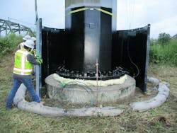 Installing steel caisson to protect foam and coatings. Installing steel caisson to protect foam and coatings.