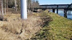 Steel pole next to Snohomish river before dike breach. Steel pole next to Snohomish river before dike breach.
