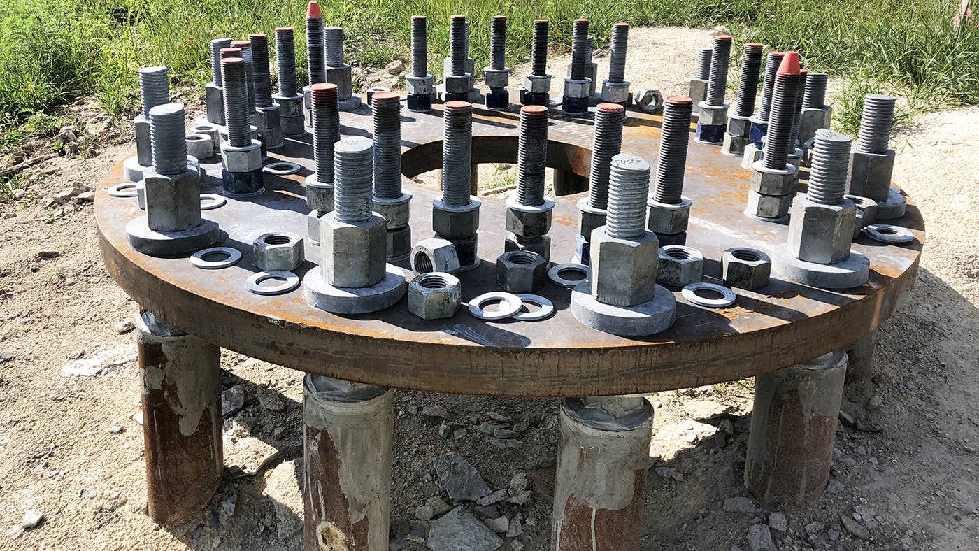 Micropile foundation with steel cap.