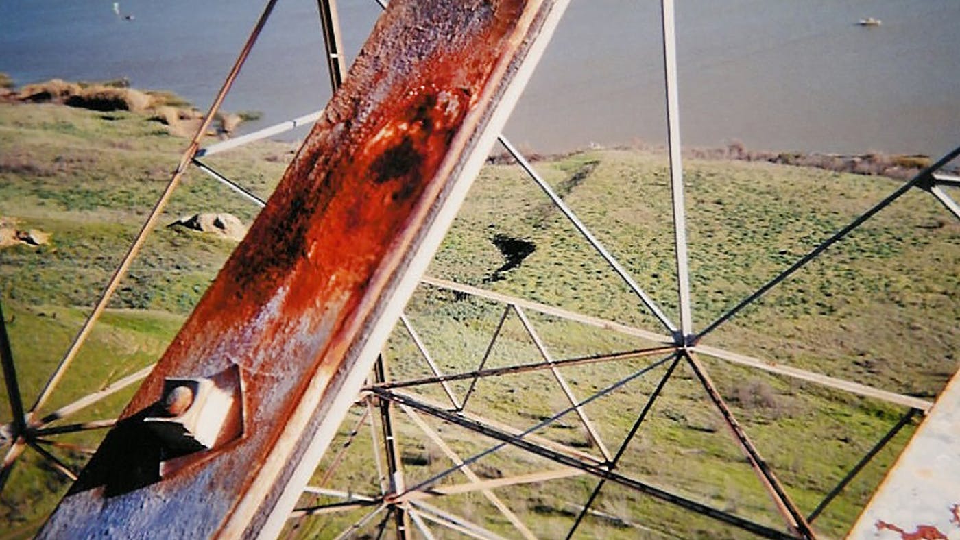 Corroded member, indicated by the bright red pitted surface.