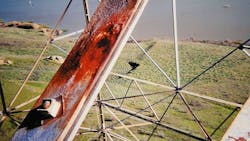 Corroded member, indicated by the bright red pitted surface. Corroded member, indicated by the bright red pitted surface.