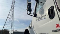 FirstEnergy truck with transmission tower FirstEnergy truck with transmission tower