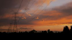 transmission towers at sunset transmission towers at sunset