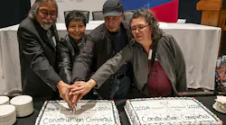 Frank McKay, Margaret Kenequanash, Harry Meekis, and Lucie Edwards cut a celebratory cake to signify the completion of Wataynikaneyap Power’s construction, connecting remote First Nations communities to reliable power.