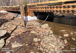 A low-water crossing with anchor chains. A low-water crossing with anchor chains.