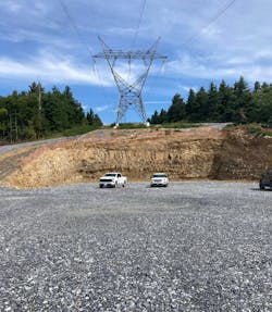 New self supporting deadend tower beside graded tension pad. New self supporting deadend tower beside graded tension pad.