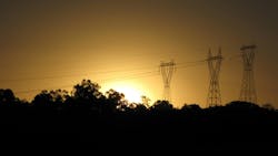 Sunset over a transmission line. Sunset over a transmission line.