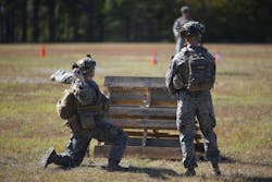 U.S. Marine Corps Sgt. Logan Elkins, left, from Ohio, with 3rd Battalion, 6th Marine Regiment, and Sgt. Hobart Whitman, from Tennessee with 2nd Light Armored Reconnaissance Battalion, both infantry riflemen, participate in simulated grenade throwing drills at Marine Corps Base Camp Lejeune, North Carolina, Oct. 21, 2024. Camp Lejeune decommissioned a battery energy storage system over cybersecurity concerns. U.S. Marine Corps Sgt. Logan Elkins, left, from Ohio, with 3rd Battalion, 6th Marine Regiment, and Sgt. Hobart Whitman, from Tennessee with 2nd Light Armored Reconnaissance Battalion, both infantry riflemen, participate in simulated grenade throwing drills at Marine Corps Base Camp Lejeune, North Carolina, Oct. 21, 2024. Camp Lejeune decommissioned a battery energy storage system over cybersecurity concerns.