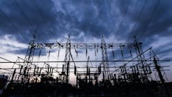 Silhouette of a substation at night. Silhouette of a substation at night.