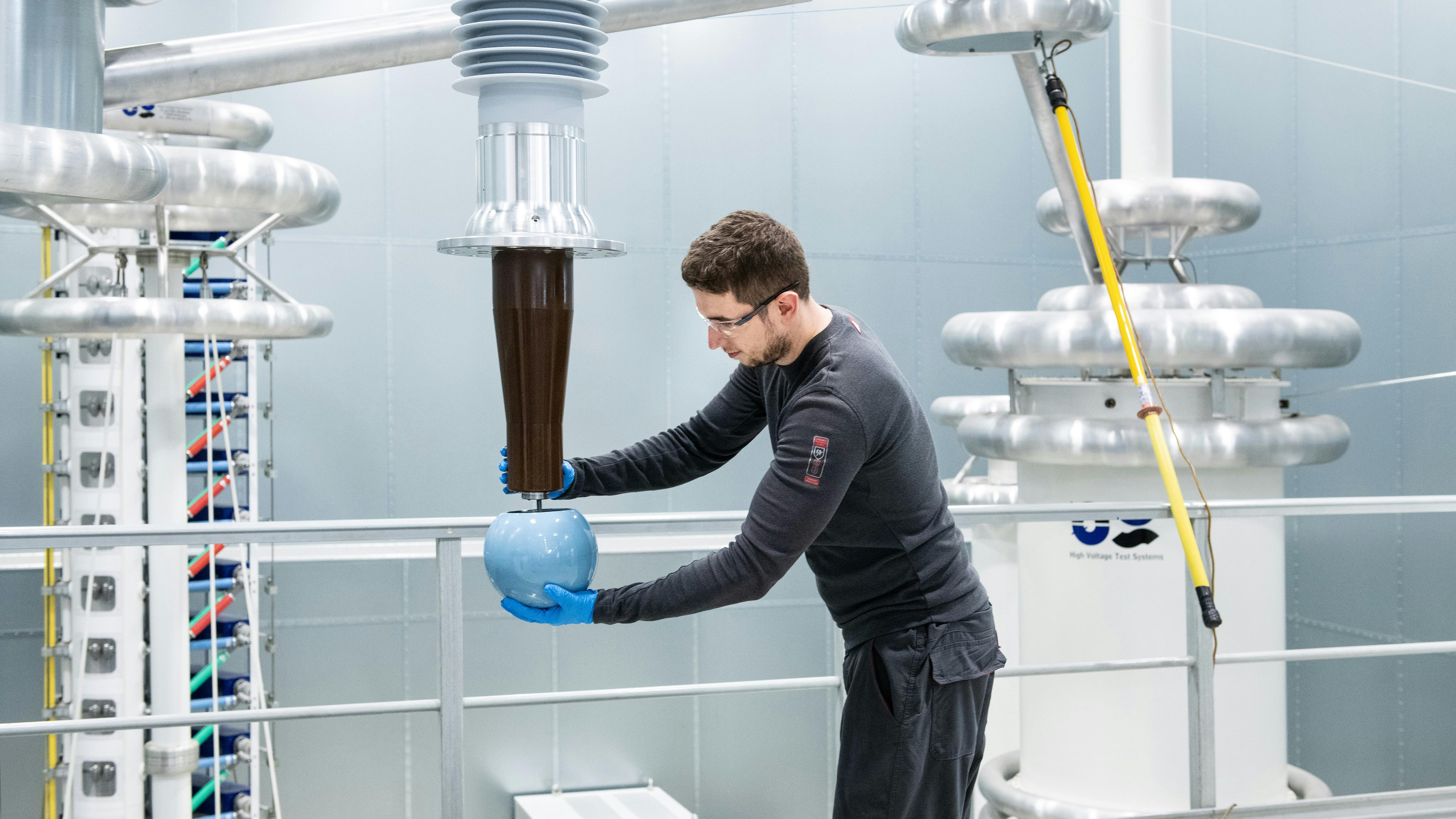 Testing at a Hitachi Energy Transformer components factory.