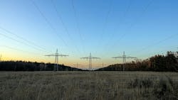 power lines with towers in distance power lines with towers in distance