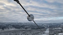 Heimdall Power Neuron sensor attached to a power line. Heimdall Power Neuron sensor attached to a power line.