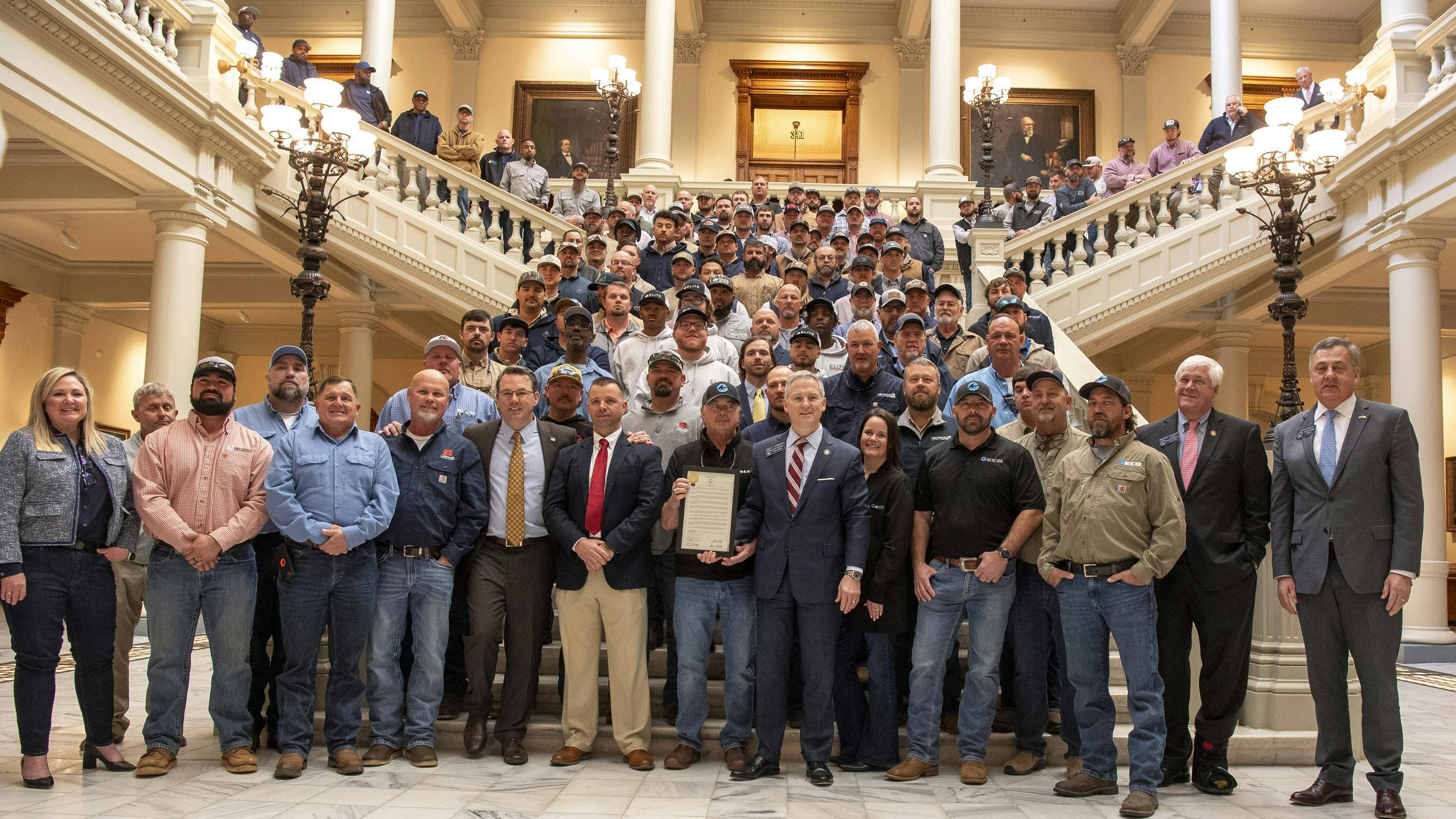State elected officials with dozens of lineworkers from Georgia Power and other electric providers to mark Georgia Linemen Day on March 11, 2025. The day was declared by the Georgia legislature to acknowledge lineworkers for their sacrifices during Hurricane Helene - which was the most destructive storm in Georgia Power's more than 140-year history.