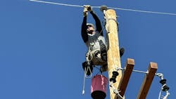 Logan Pollei, an apprentice for Duke Energy, removes the preform from the line to complete this step in the second mystery event at the 2024 International Lineman’s Rodeo. Logan Pollei, an apprentice for Duke Energy, removes the preform from the line to complete this step in the second mystery event at the 2024 International Lineman’s Rodeo.