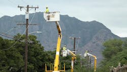Hawaiian Electric crews replace older power lines with aluminum cabling along Hakimo Road in Waiʻanae, an initiative under its Wildfire Safety Strategy. Hawaiian Electric crews replace older power lines with aluminum cabling along Hakimo Road in Waiʻanae, an initiative under its Wildfire Safety Strategy.