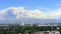 Colossal wall of wildfire smoke billows over mountains near Los Angeles, California. Colossal wall of wildfire smoke billows over mountains near Los Angeles, California.