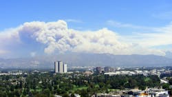 Colossal wall of wildfire smoke billows over mountains near Los Angeles, California. Colossal wall of wildfire smoke billows over mountains near Los Angeles, California.