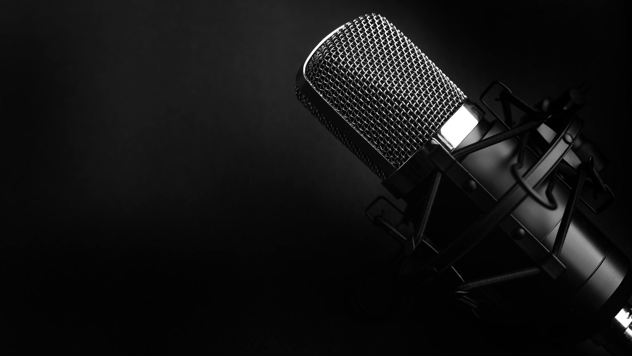 Microphone against black backdrop