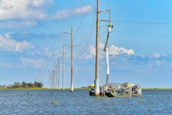 Entergy transmission crews work with contractors to replace damaged insulators via airboats in Chauvin, Louisiana after Hurricane Francine. Entergy transmission crews work with contractors to replace damaged insulators via airboats in Chauvin, Louisiana after Hurricane Francine.