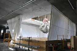 Construction photograph from 2nd below grade floor of soil being removed from 3rd below grade floor. Construction photograph from 2nd below grade floor of soil being removed from 3rd below grade floor.