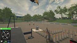 A simulated boom truck prepares to move a cylinder representing a heavy weight. A simulated boom truck prepares to move a cylinder representing a heavy weight.