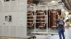 Large transformers are assembled at a Hitachi Energy plant. Large transformers are assembled at a Hitachi Energy plant.