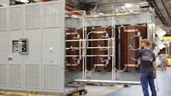 Large transformers are assembled at a Hitachi Energy plant. Large transformers are assembled at a Hitachi Energy plant.