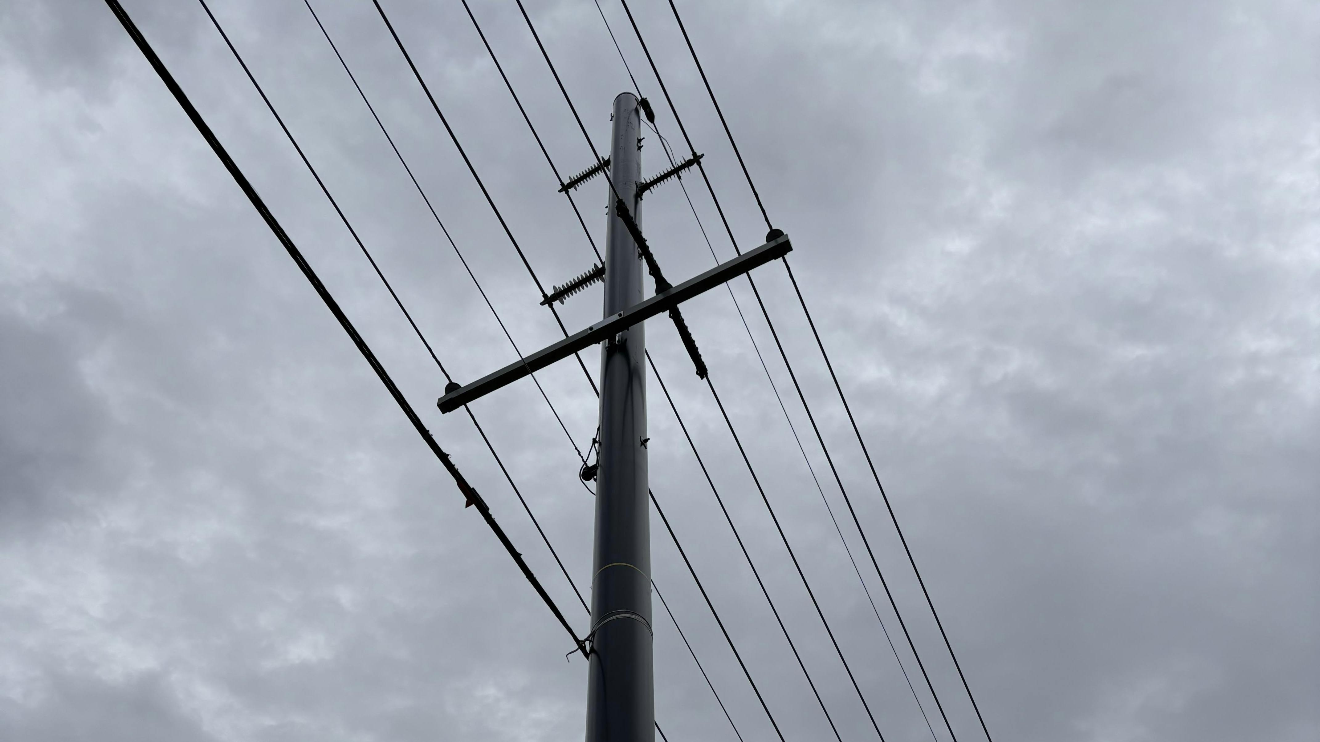 Although the winds downed the four wood poles, the FRP poles on either end of the group stayed standing