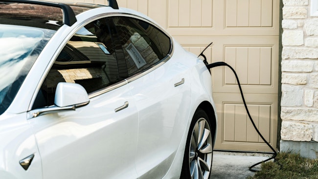 Charging an EV at a residential home. Duke Energy Florida launched a four-year Behavioral Managed EV Charging Program aimed at reducing peak grid load by encouraging EV owners to charge during off-peak hours.