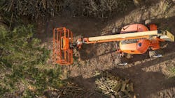 Aerial shot of an articulated boom lift positioned for tree trimming. Aerial shot of an articulated boom lift positioned for tree trimming.