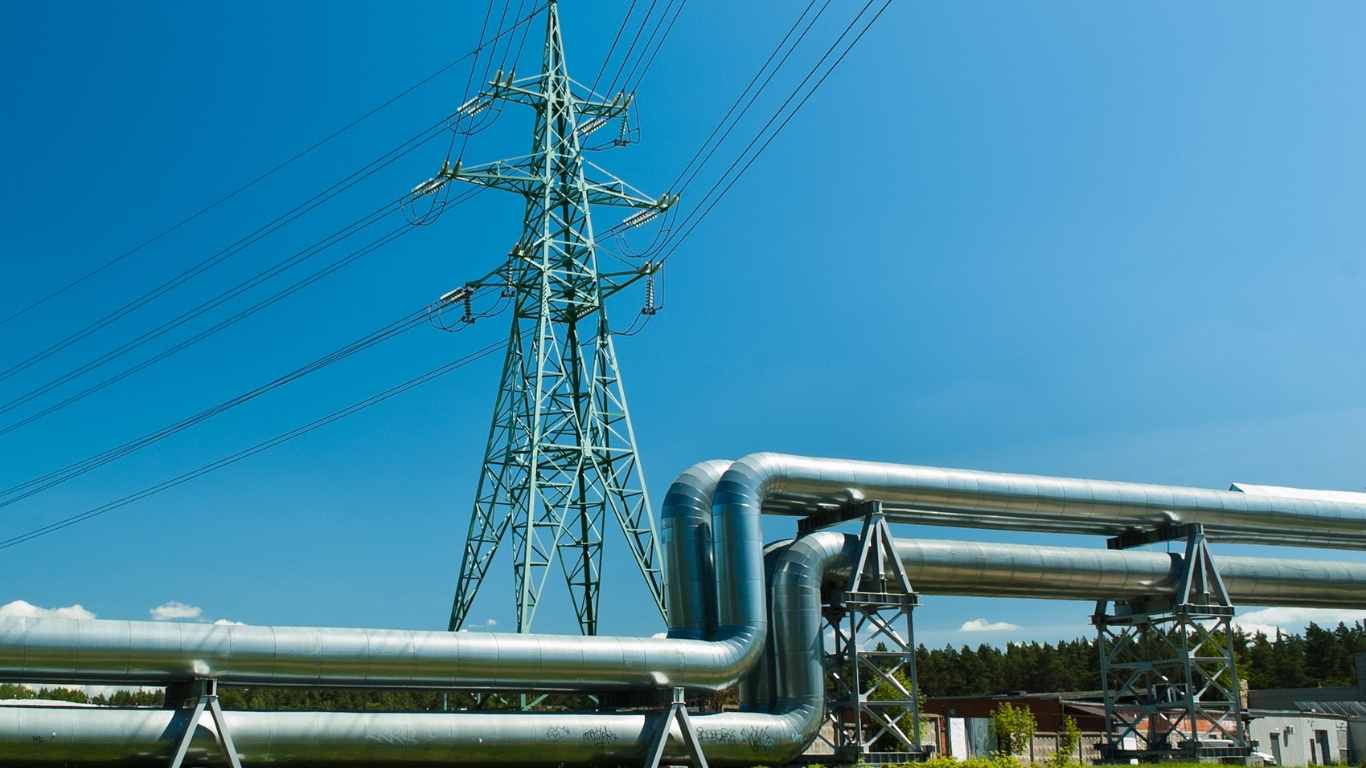6883c18c63d73397dc28f8f2 Pipeline And Power Line Against Blue Sky 1366x76