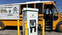 A Tellus Power bidirectional charger plugged into a Thomas Built electric school bus at the Fremont Unified School District bus depot. A Tellus Power bidirectional charger plugged into a Thomas Built electric school bus at the Fremont Unified School District bus depot.