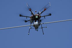 A drone installing a DLR sensor. A drone installing a DLR sensor.