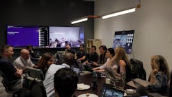 people in a conference room people in a conference room