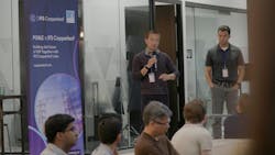 two speakers in front of audience two speakers in front of audience