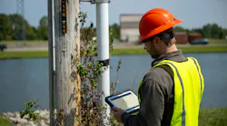 utility worker with mobile computer utility worker with mobile computer
