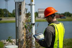 utility worker with mobile computer utility worker with mobile computer