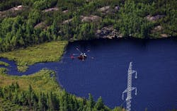 Over 90,000 helicopter hours were logged for tower erection, insulator hanging, transmission line stringing, and transport. Over 90,000 helicopter hours were logged for tower erection, insulator hanging, transmission line stringing, and transport.