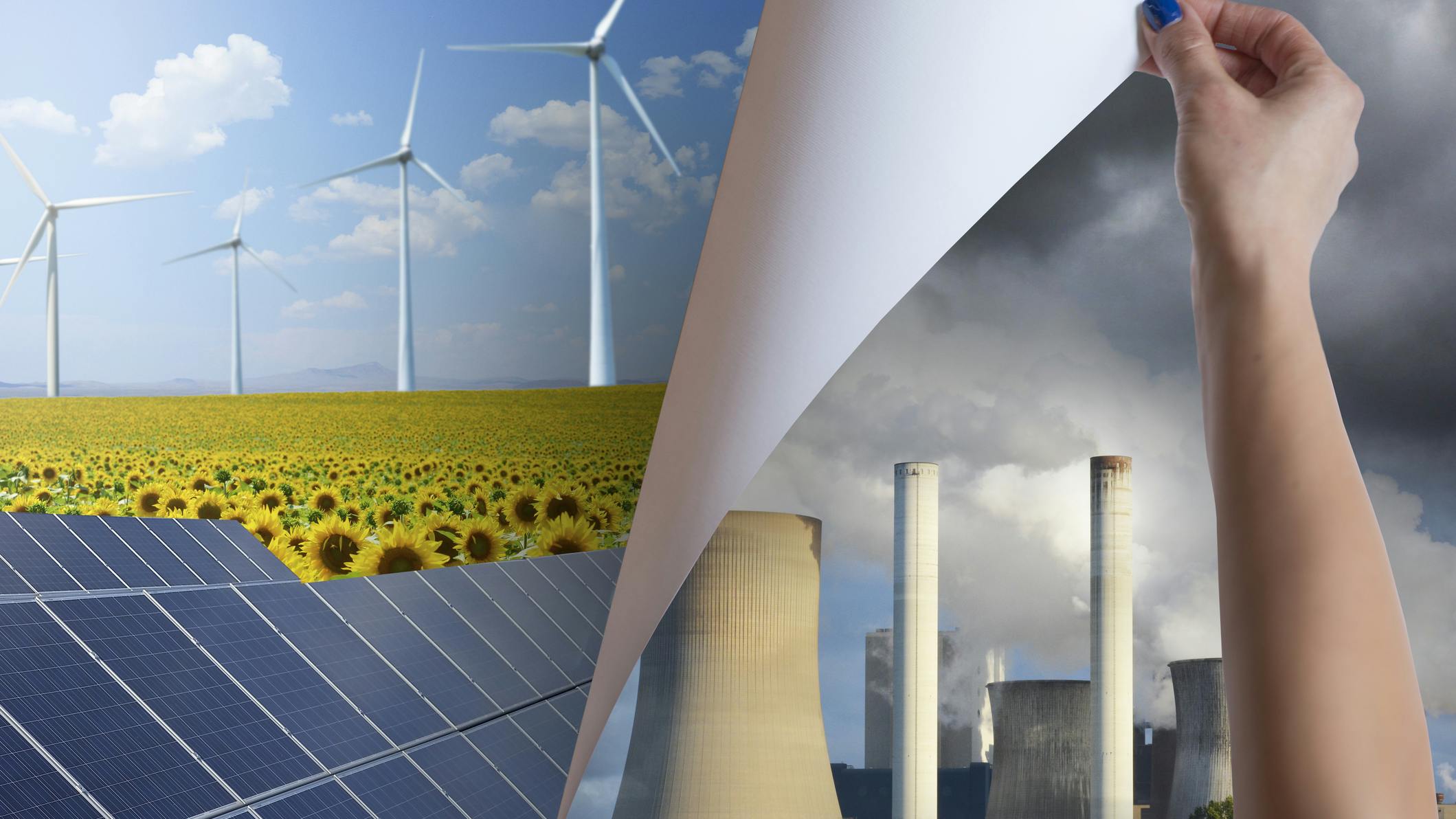 hand turning page from coal to wind and solar