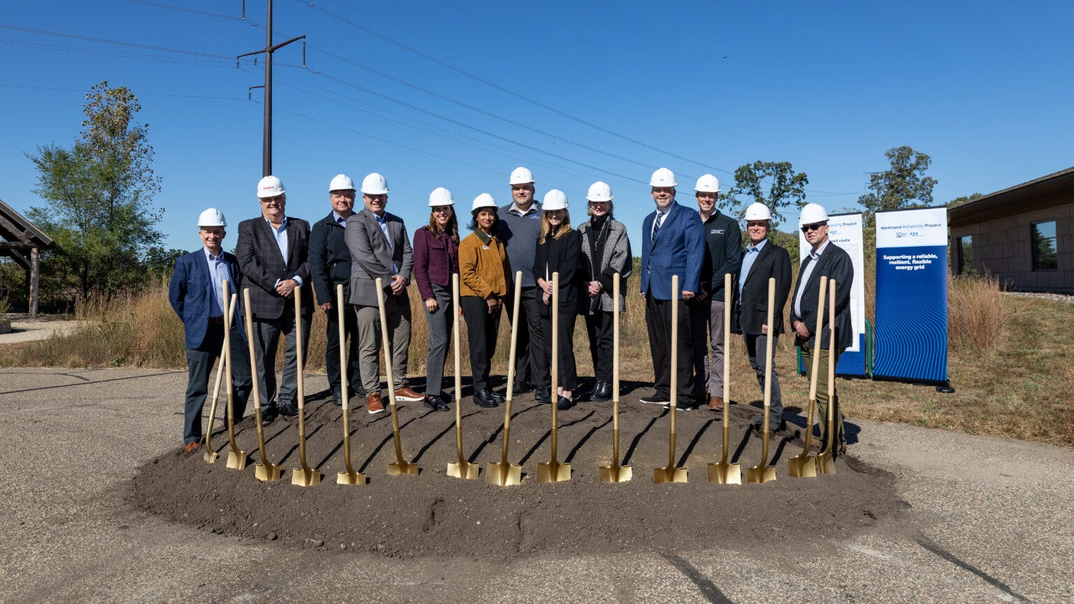 Pictured, from left to right, are: Brian Tulloh, executive director, external affairs, MISO; Pat Michels, CEO and president, Michels Corporation; Steve Lawler, regional transmission project manager, Great River Energy; Greg Schutte, director, portfolio delivery, Great River Energy; Katie Sieben, chair, Minnesota Public Utilities Commission; Priti Patel, vice president and chief transmission officer, Great River Energy; Josh Skelton, chief operating officer, Minnesota Power; Audrey Partridge, commissioner, Public Utilities Commission; Bethany Owen, president, chief executive officer and chair, ALLETE, Inc.; Dan Gunderson, vice president, transmission and distribution, Minnesota Power; Dan Aagenes, director of enterprise projects, Minnesota Power; Kent Ogston, director of engineering services, Minnesota Power; Pete Wyckoff, deputy commissioner of energy resources, Minnesota Department of Commerce.