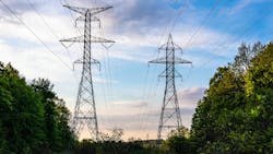 A low angle shot of the High voltage transmission line Ontario, Canada A low angle shot of the High voltage transmission line Ontario, Canada