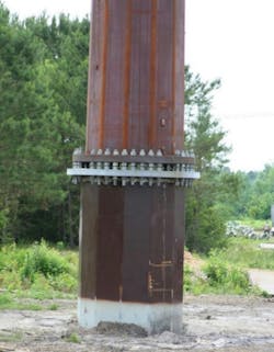 Vibratory caisson supported steel pole. Vibratory caisson supported steel pole.