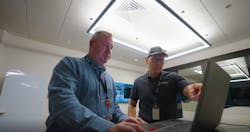 Chris Ott and colleague Charlie Koenig discuss strategic substation security upgrades. Chris Ott and colleague Charlie Koenig discuss strategic substation security upgrades.